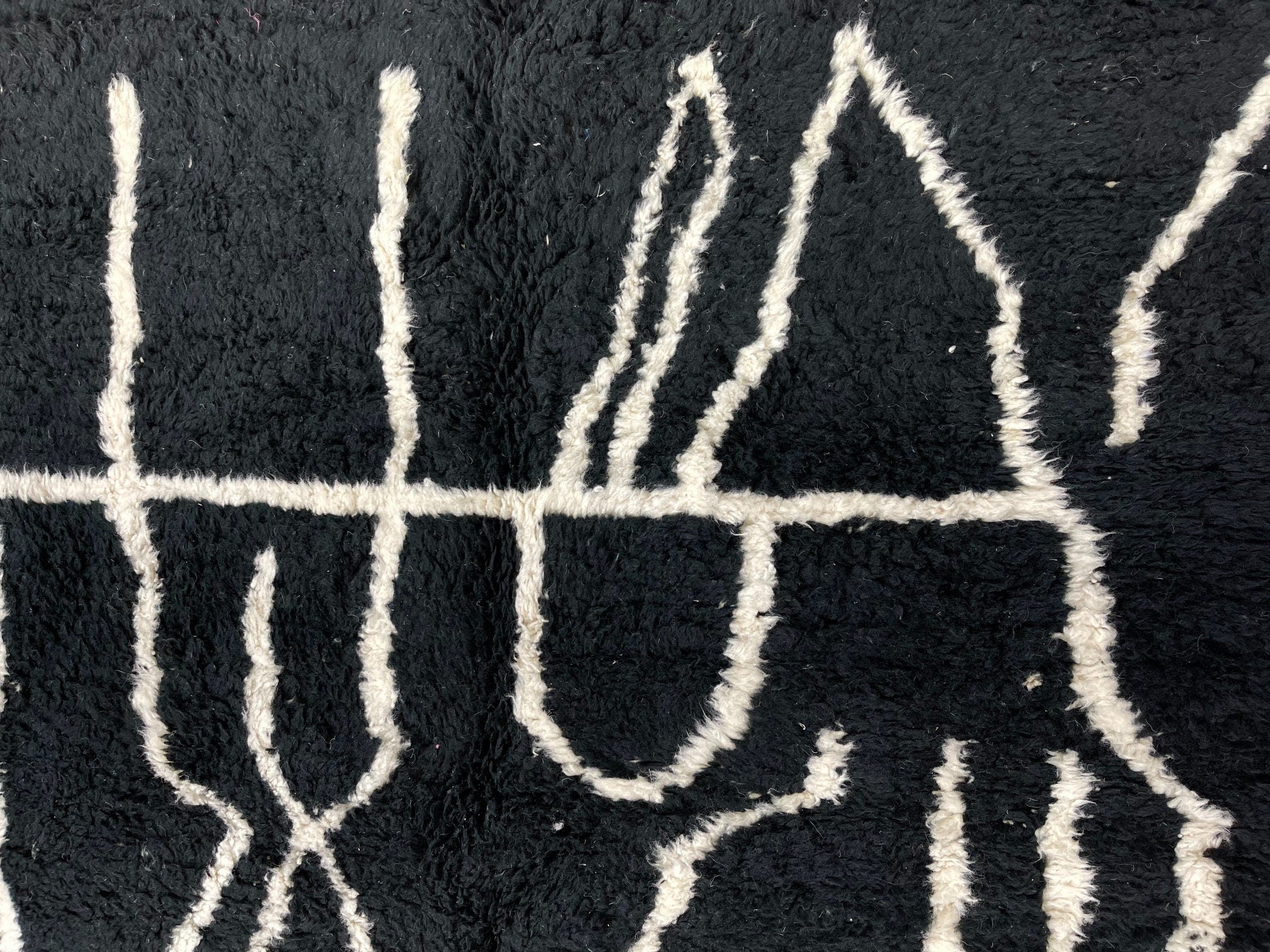 black and white patterned rug close up