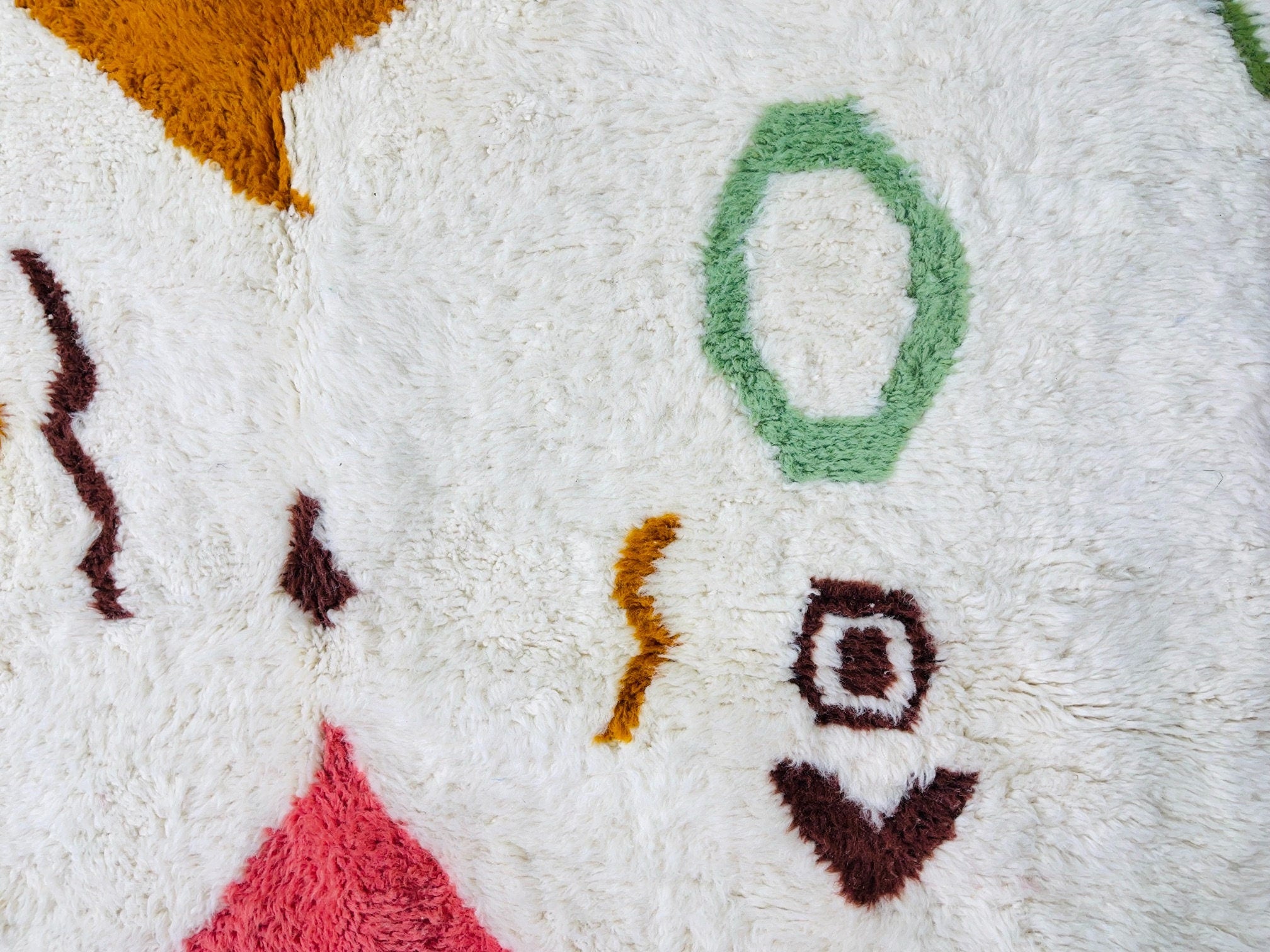 colorful geometric patterns on soft fluffy rug