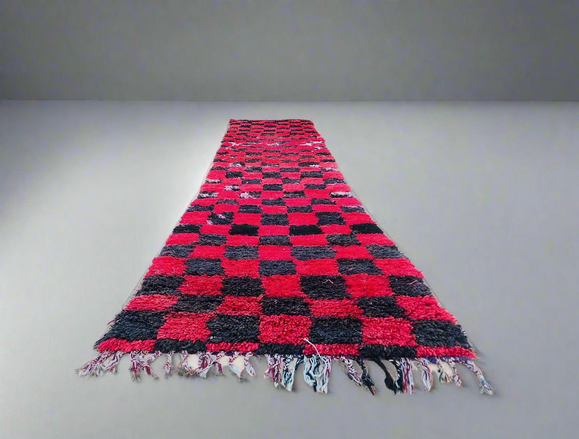 Colorful checkered rug with red and black patterns, ideal for modern home décor.