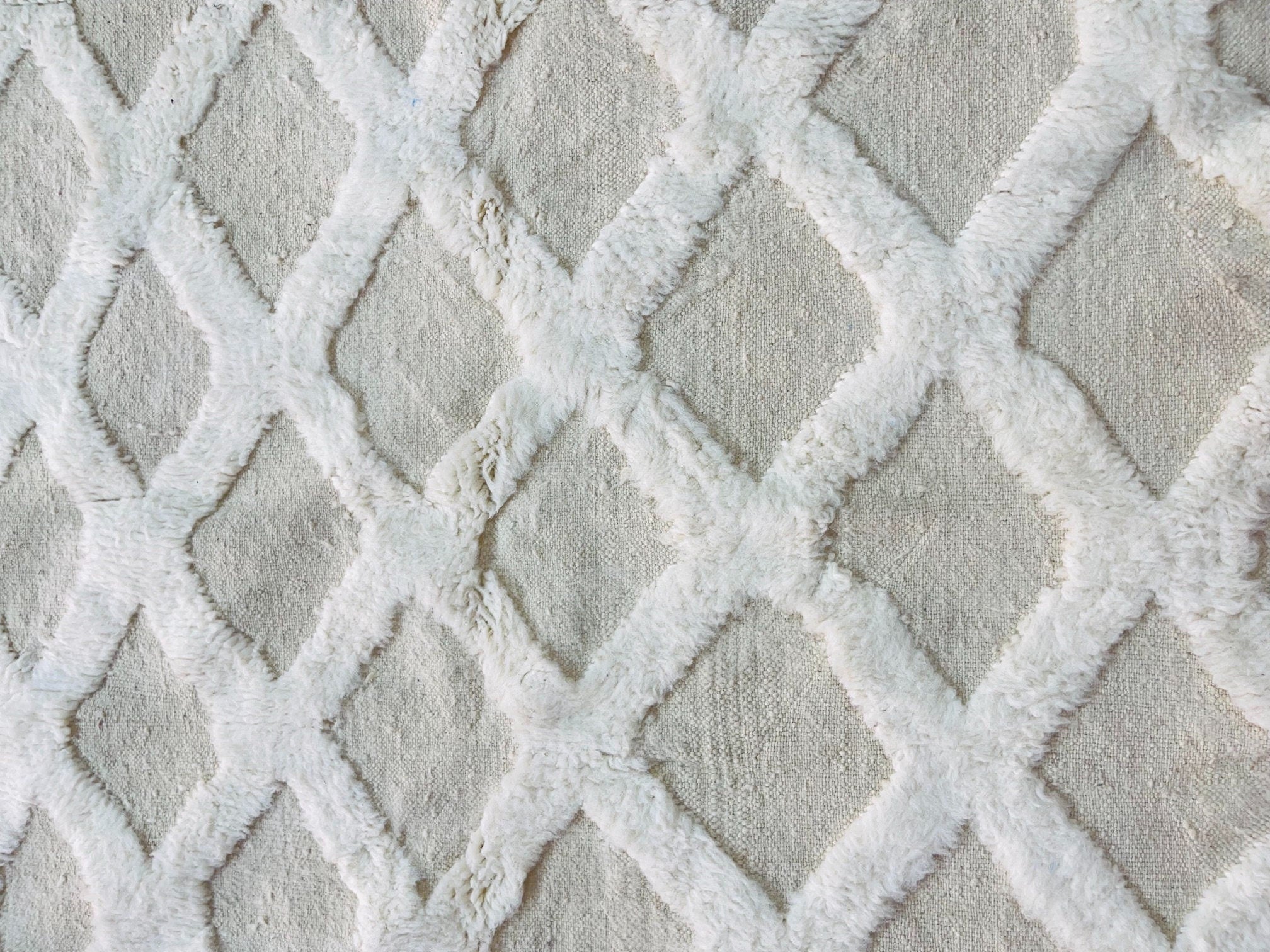 white plush fabric with diamond pattern design