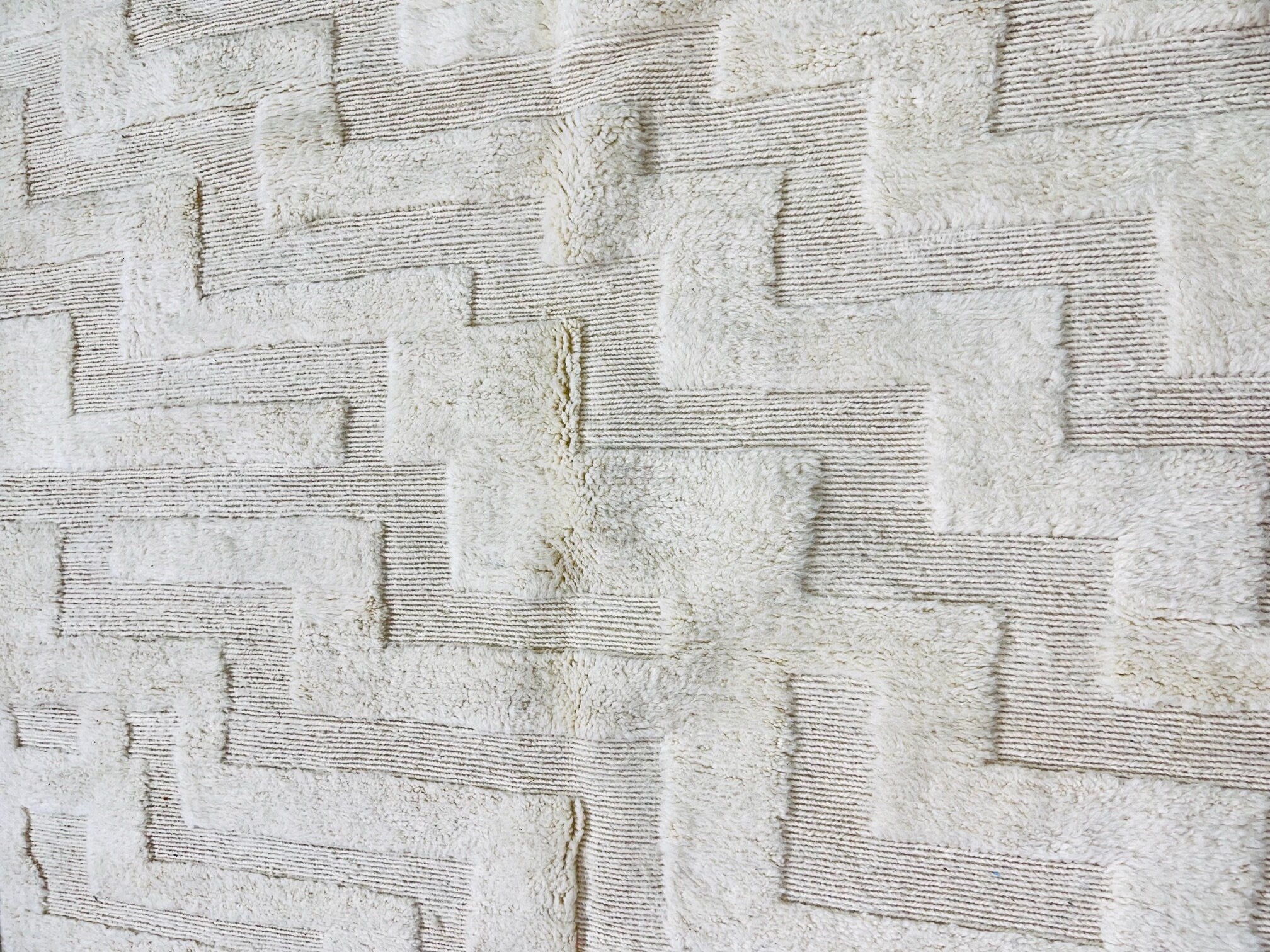 textured white fabric with zigzag pattern design