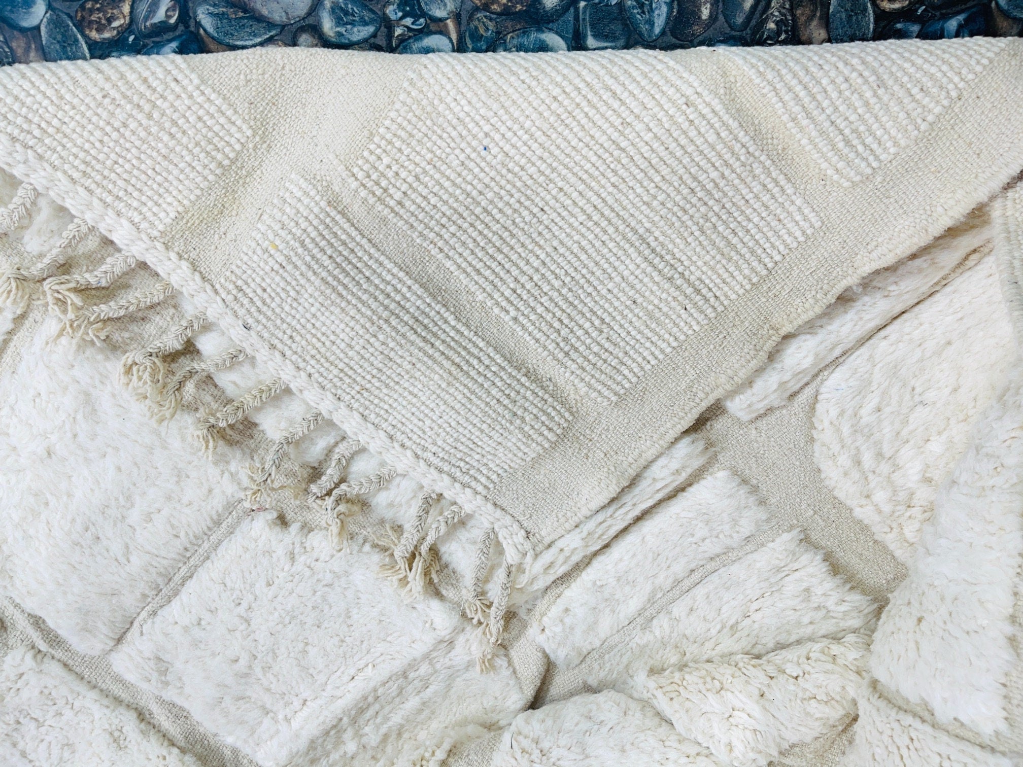 soft cream blanket with textured fabric design