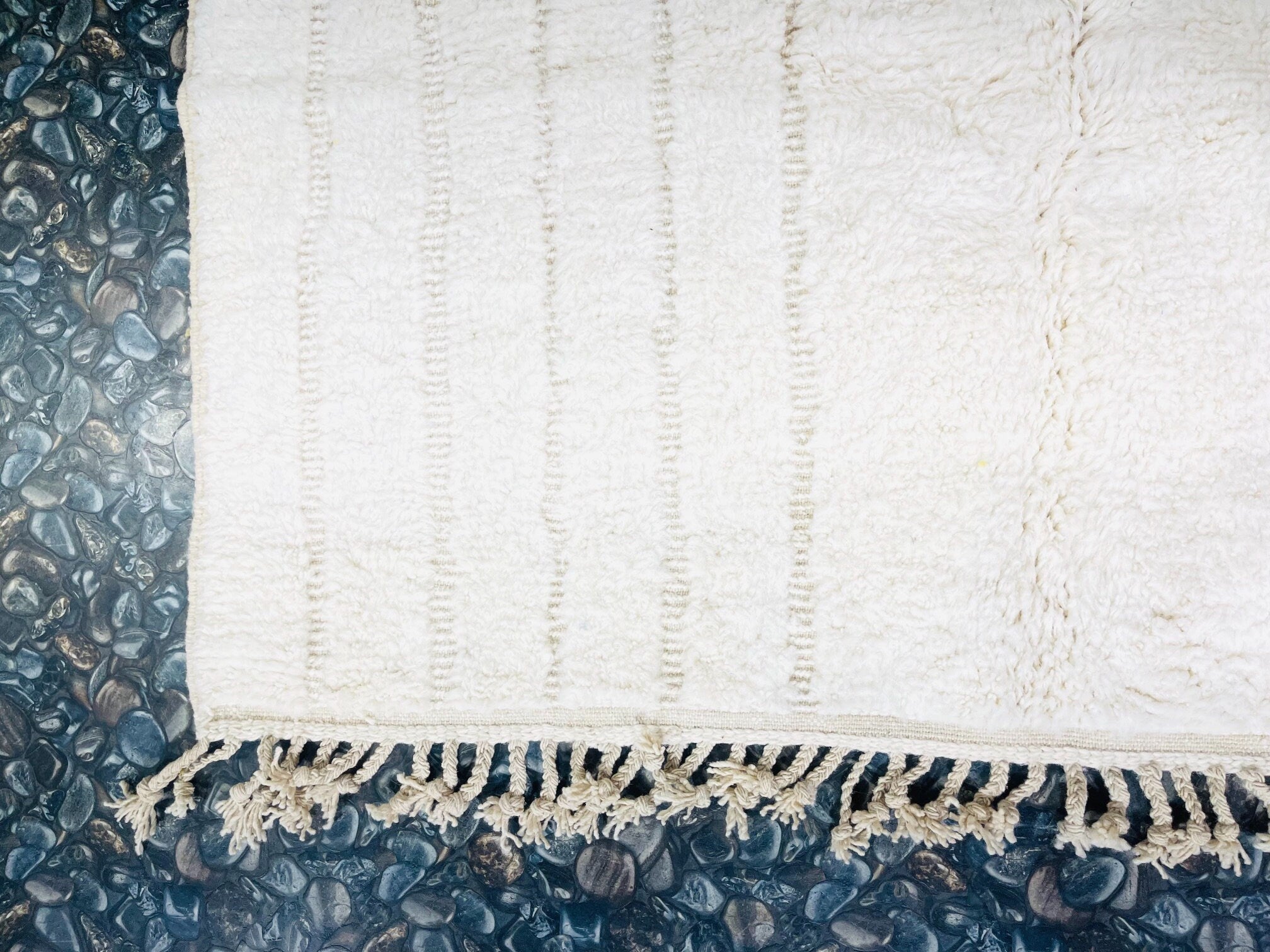 white textured towel on stone background decorative