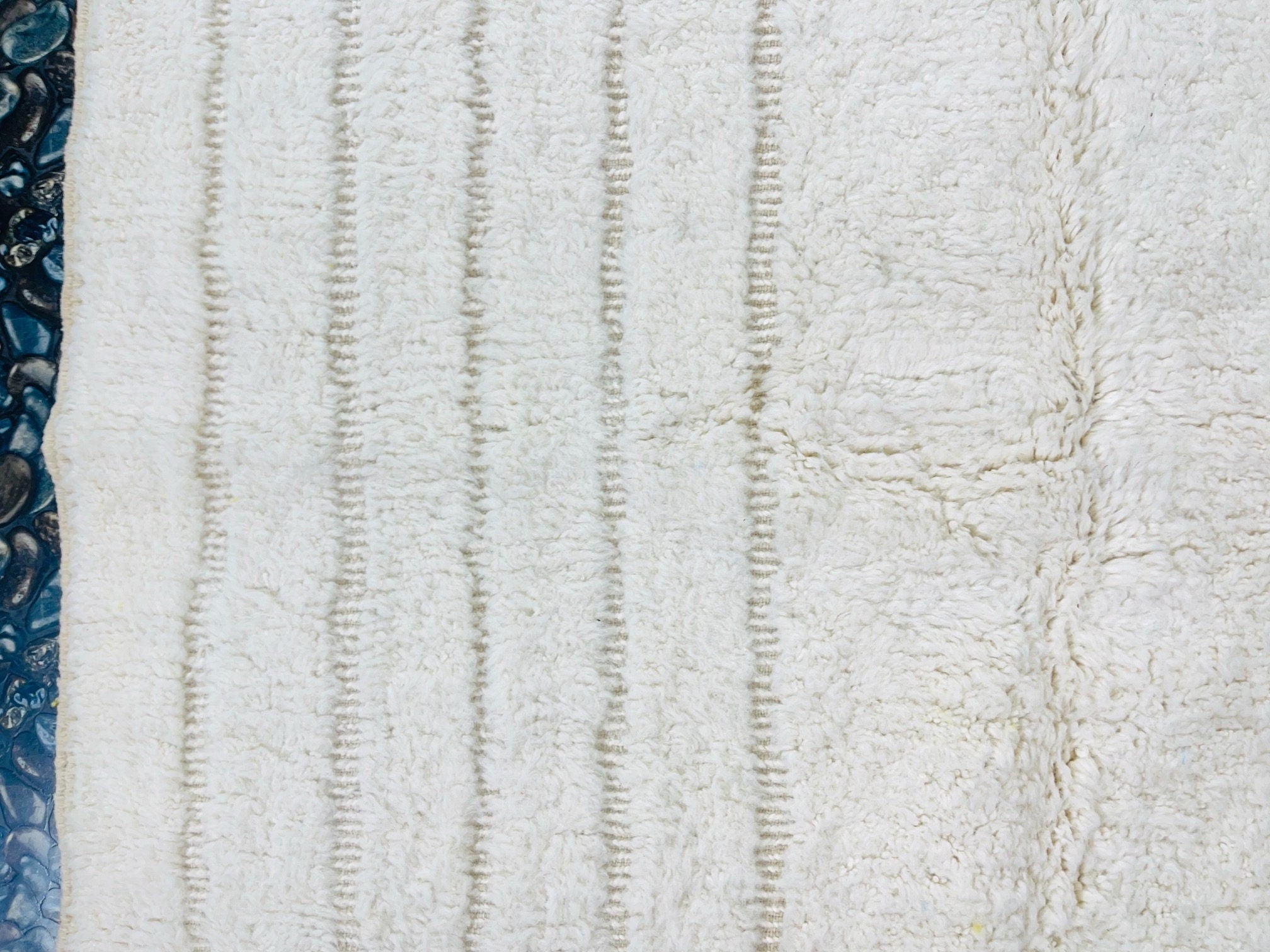 soft white textured fabric with subtle lines